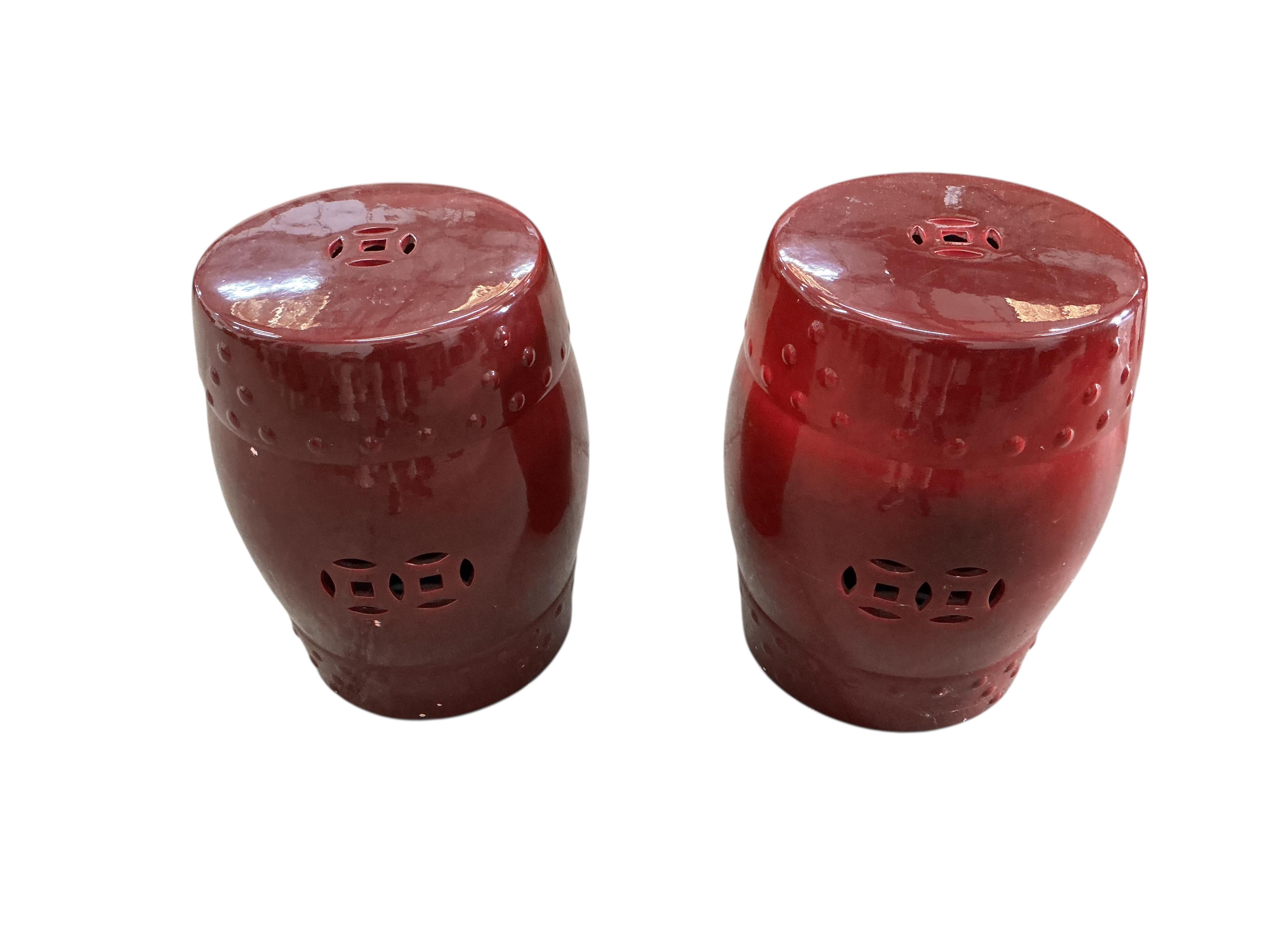 A pair of Chinese flambé glazed earthenware garden seats, diameter 32cm, height 47cm, Provenance: The late Kenneth Turner (1936-2025), celebrity florist, designer and perfume retailer, he received the Royal Warrant from